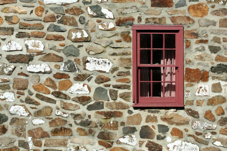 old-stone-house-with-window-2023-11-27-04-52-37-utc-scaled.jpg